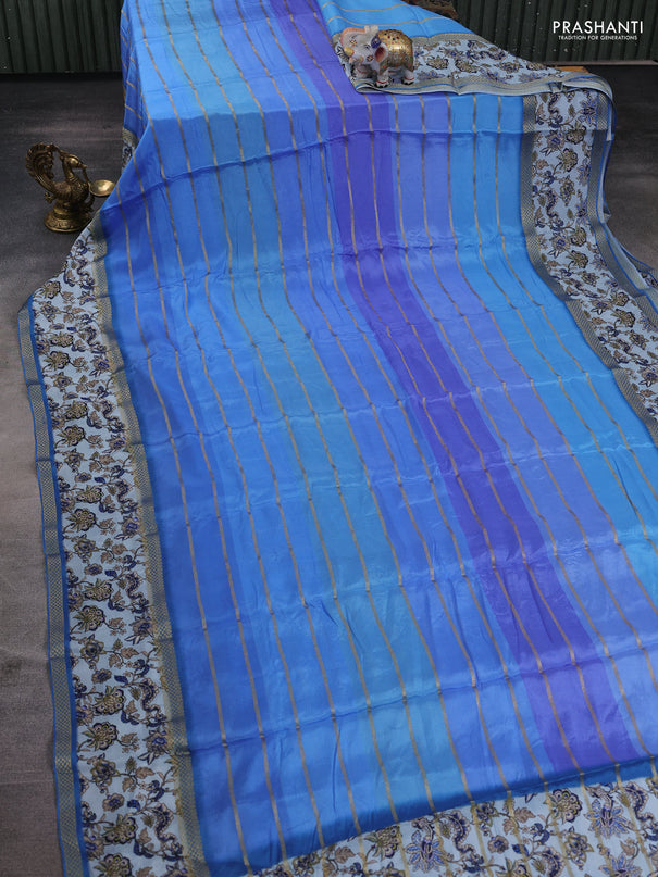 Art chiffon saree blue shade and pastel blue with allover zari stripe pattern and zari woven printed borded