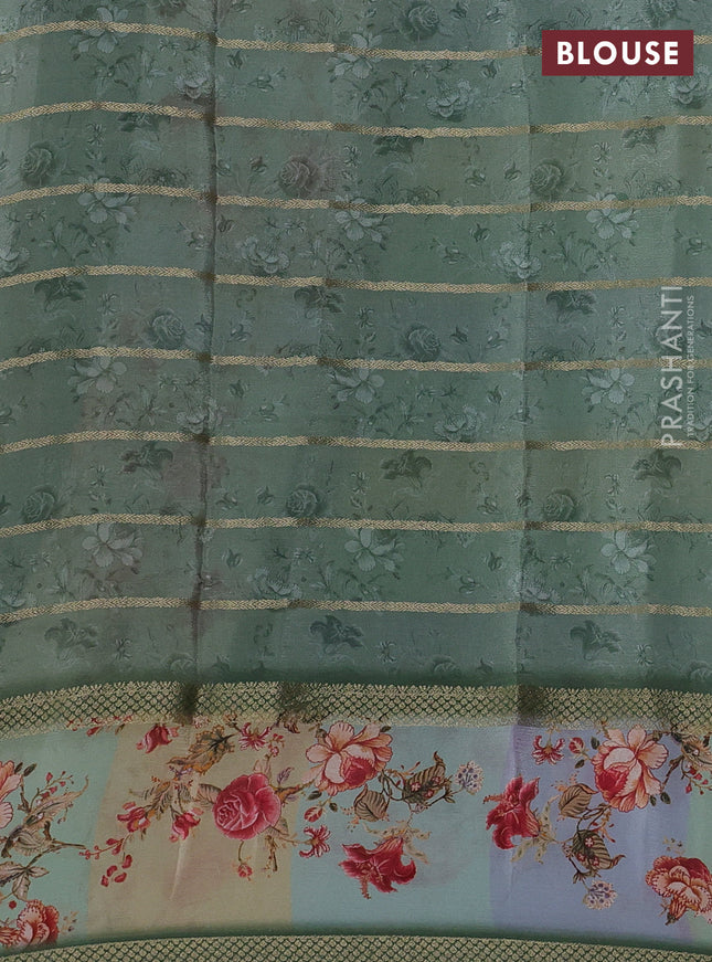 Art chiffon saree pastel green with allover zari stripe pattern and zari woven printed borded