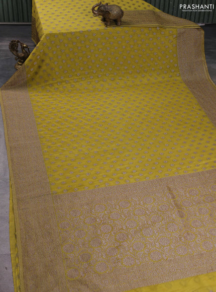 Banarasi semi georegette saree mehendi green with allover thread & zari woven buttas and zari woven border