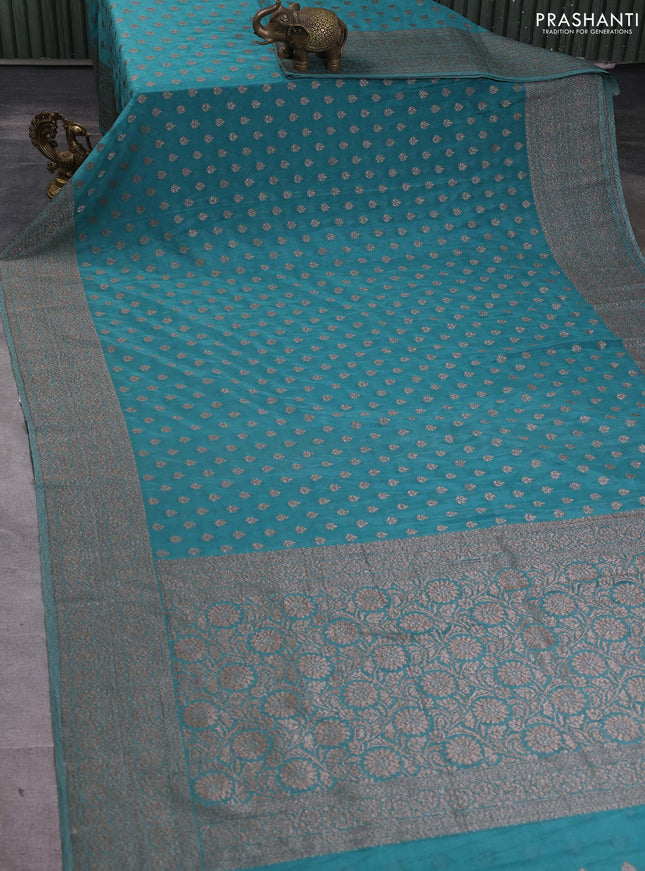 Banarasi semi georegette saree teal blue with allover thread & zari woven buttas and zari woven border
