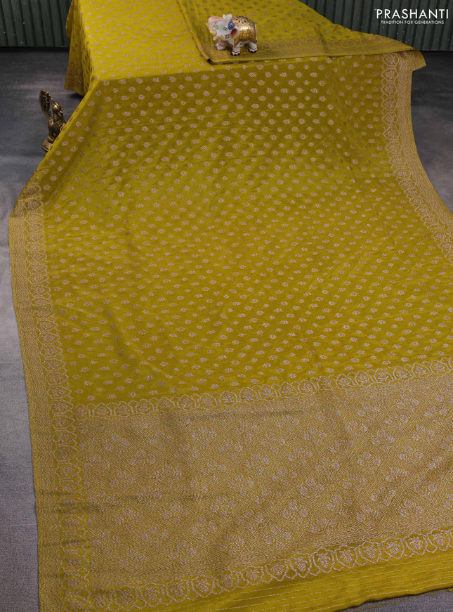 Banarasi semi georegette saree light green with allover thread & zari woven buttas and zari woven border