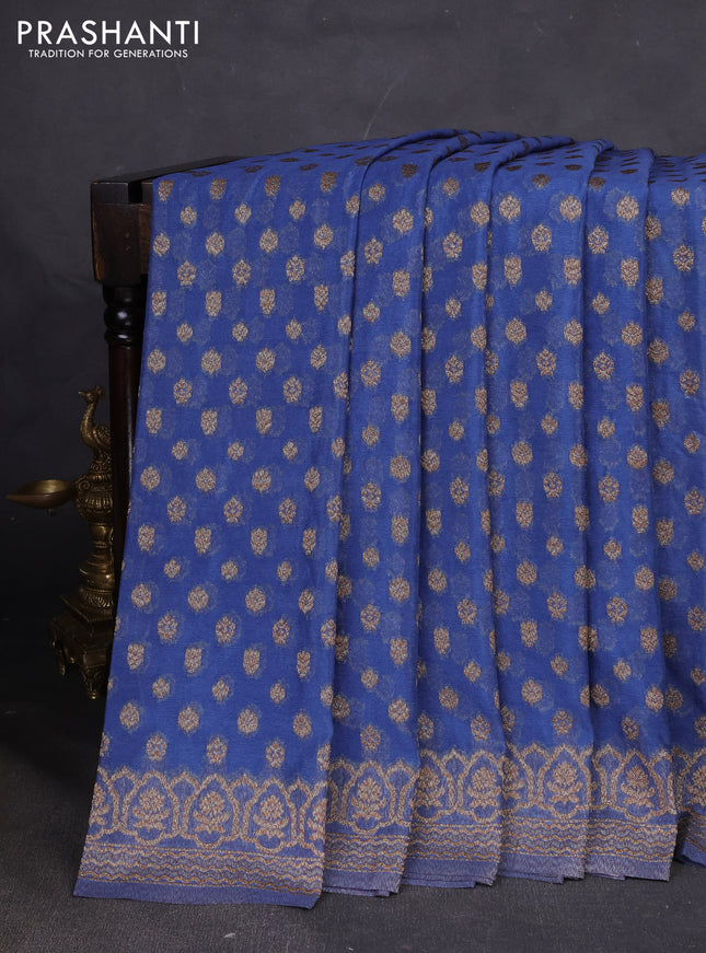 Banarasi semi georegette saree blue shade with allover thread & zari woven buttas and zari woven border