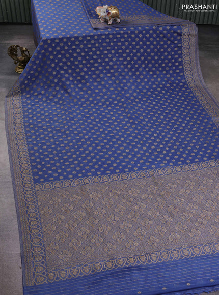 Banarasi semi georegette saree blue shade with allover thread & zari woven buttas and zari woven border