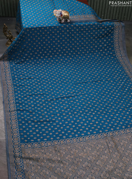 Banarasi semi georegette saree peacock blue with allover thread & zari woven buttas and zari woven border