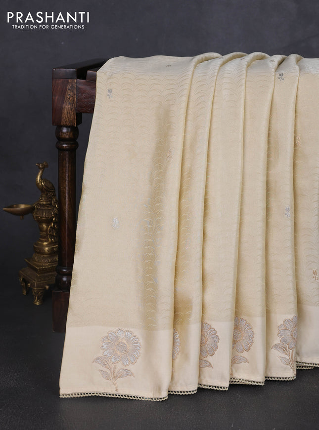 Banarasi silk saree cream with allover zari woven brocade weaves and embroidery pallu & zari woven butta border