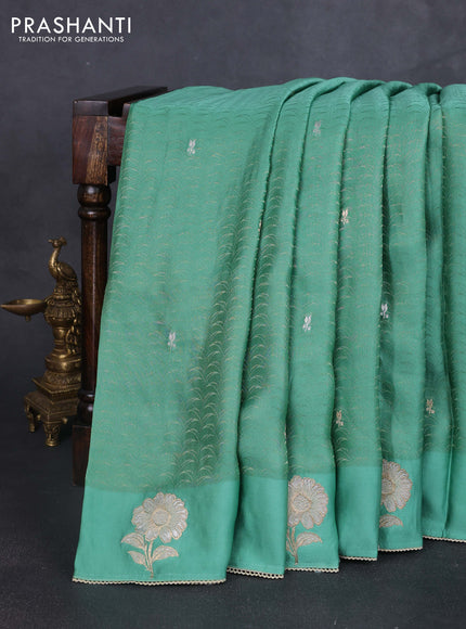 Banarasi silk saree teal green shade with allover zari woven brocade weaves and embroidery pallu & zari woven butta border