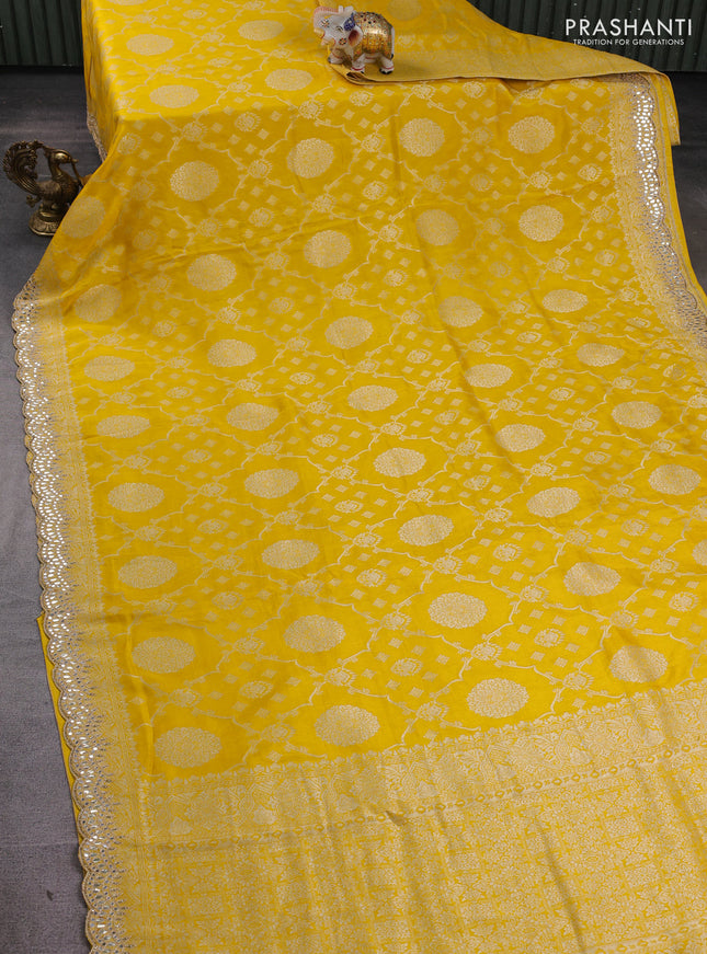 Banarasi silk saree yellow with allover zari weaves and mirror gotapatti embroidery border