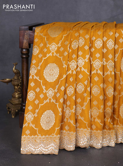 Banarasi silk saree dark mustard with allover zari weaves and mirror gotapatti embroidery border