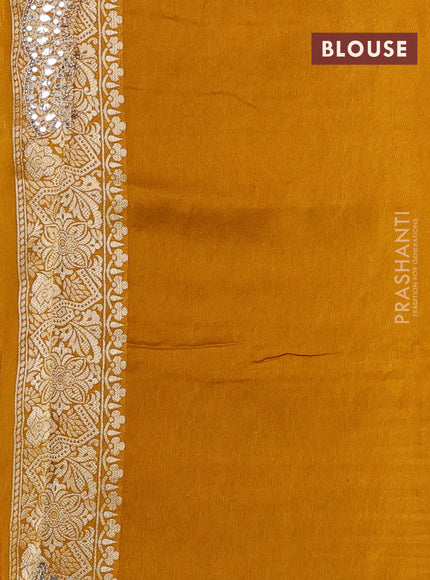 Banarasi silk saree dark mustard with allover zari weaves and mirror gotapatti embroidery border