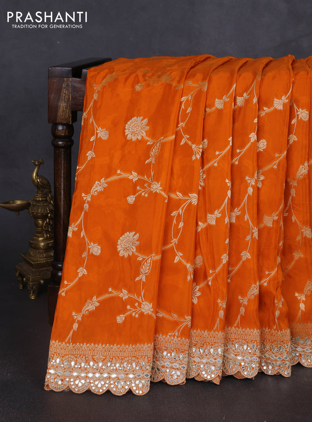 Banarasi silk saree orange with allover floral zari weaves and mirror gotapatti embroidery border