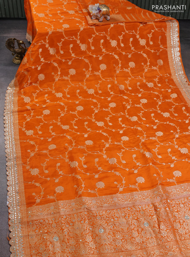 Banarasi silk saree orange with allover floral zari weaves and mirror gotapatti embroidery border