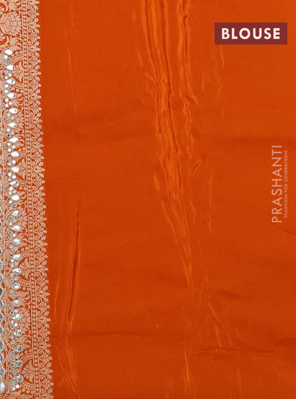 Banarasi silk saree orange with allover floral zari weaves and mirror gotapatti embroidery border