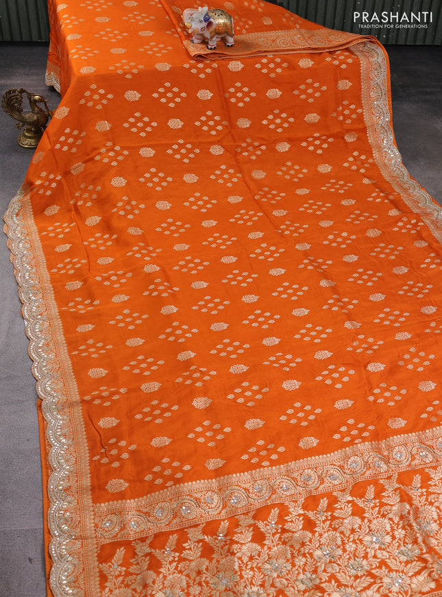 Banarasi silk saree orange with allover zari woven buttas and mirror gotapatti embroidery border
