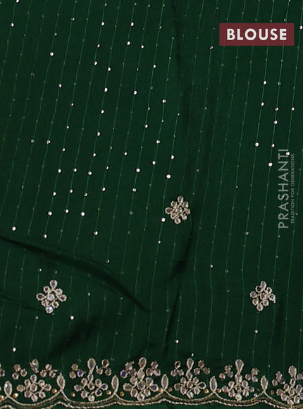 Banarasi silk saree bottle green with mirror embroidery buttas and mirror embroidery border
