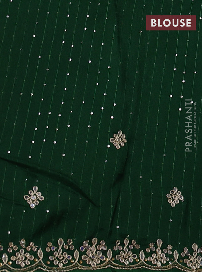 Banarasi silk saree bottle green with mirror embroidery buttas and mirror embroidery border