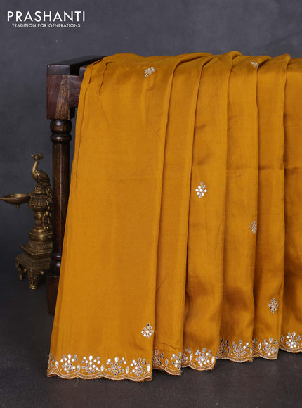 Banarasi silk saree dark mustard with mirror embroidery buttas and mirror embroidery border
