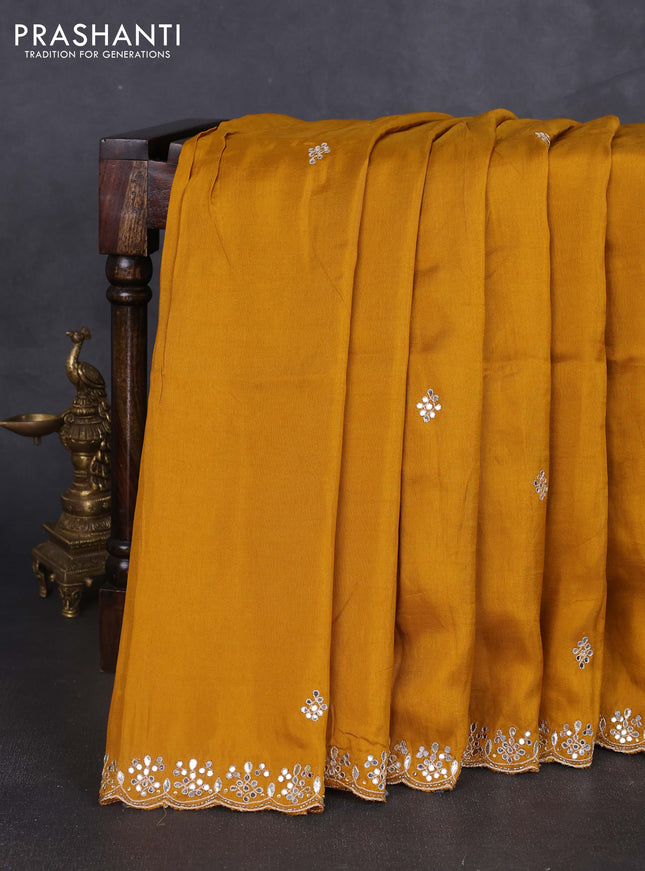 Banarasi silk saree dark mustard with mirror embroidery buttas and mirror embroidery border