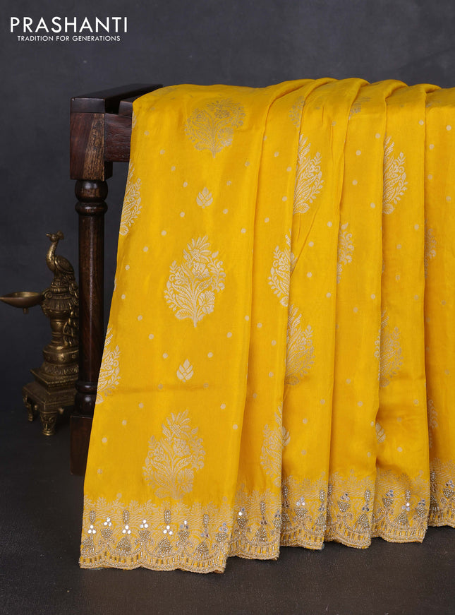 Banarasi silk saree yellow with allover woven buttas and mirror & beaded work embroidery border