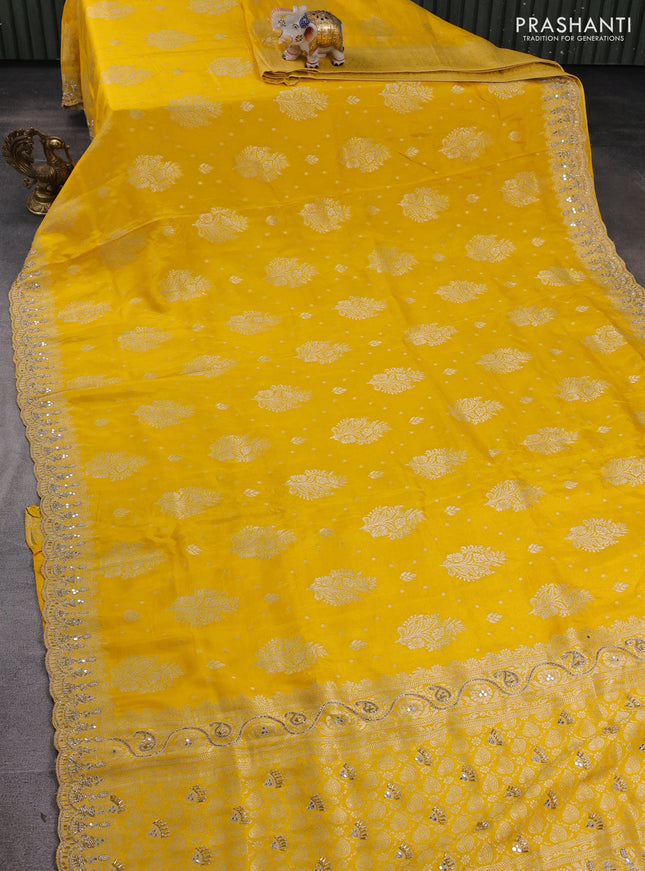 Banarasi silk saree yellow with allover woven buttas and mirror & beaded work embroidery border
