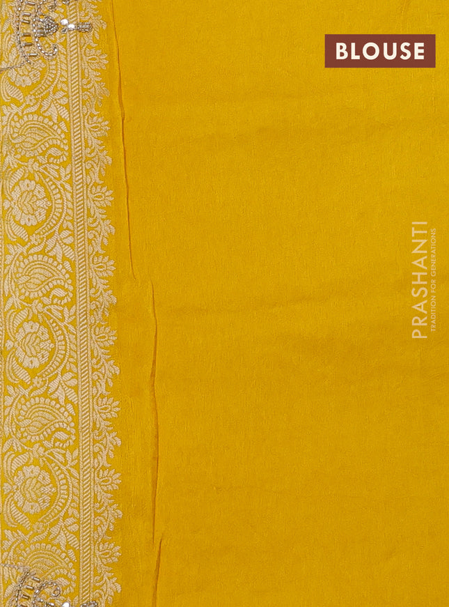Banarasi silk saree yellow with allover woven buttas and mirror & beaded work embroidery border