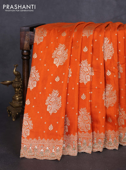 Banarasi silk saree orange with allover woven buttas and mirror & beaded work embroidery border