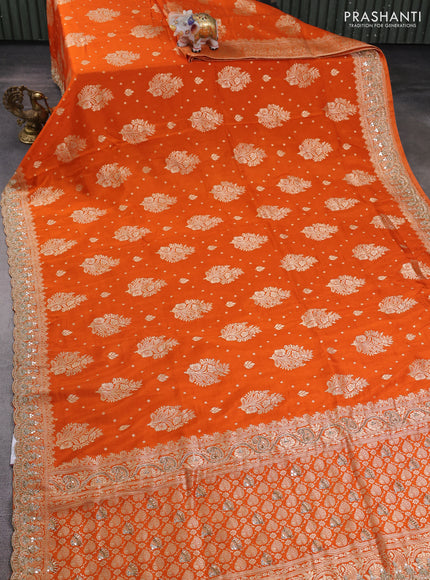 Banarasi silk saree orange with allover woven buttas and mirror & beaded work embroidery border