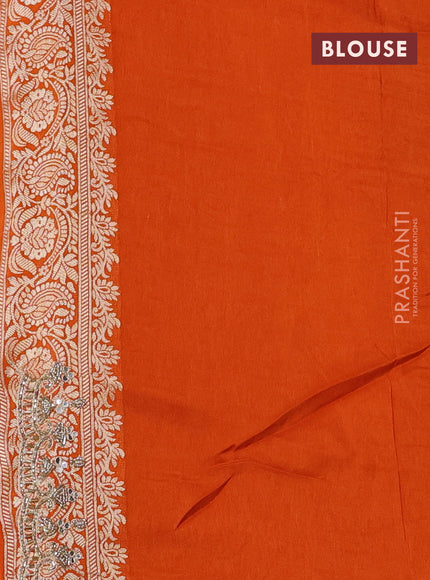 Banarasi silk saree orange with allover woven buttas and mirror & beaded work embroidery border