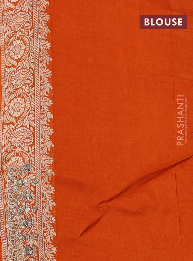 Banarasi silk saree orange with allover woven buttas and mirror & beaded work embroidery border