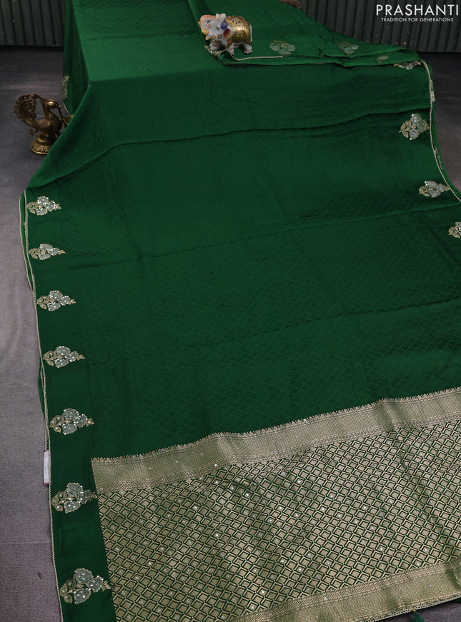 Banarasi silk saree bottle green with allover self emboss and mirror work embroidery pallu