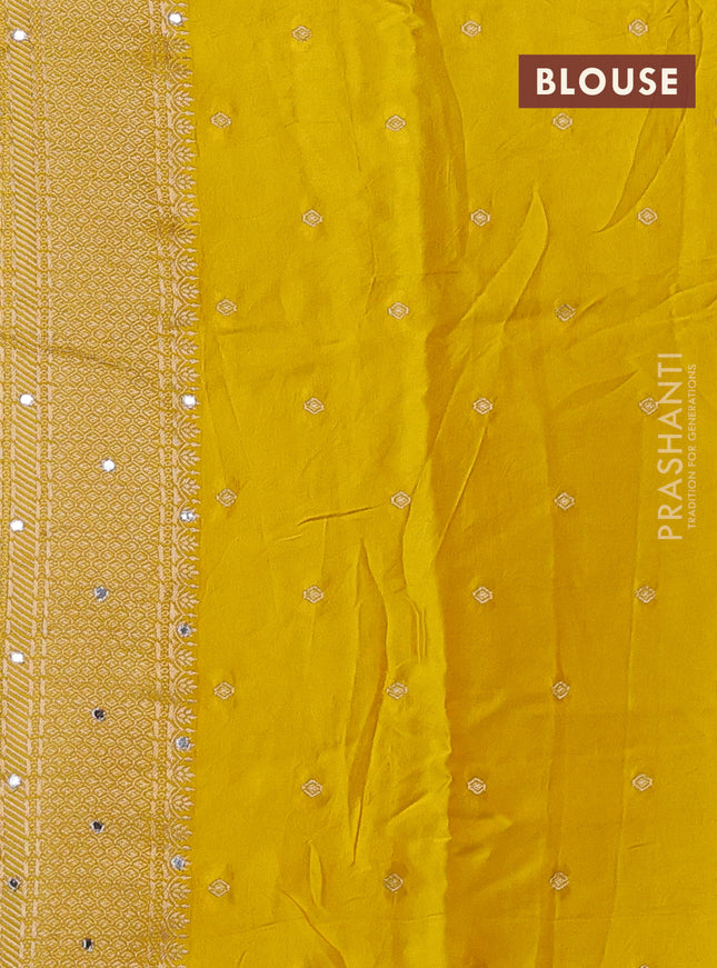 Banarasi silk saree yellow with allover self emboss and mirror work embroidery pallu