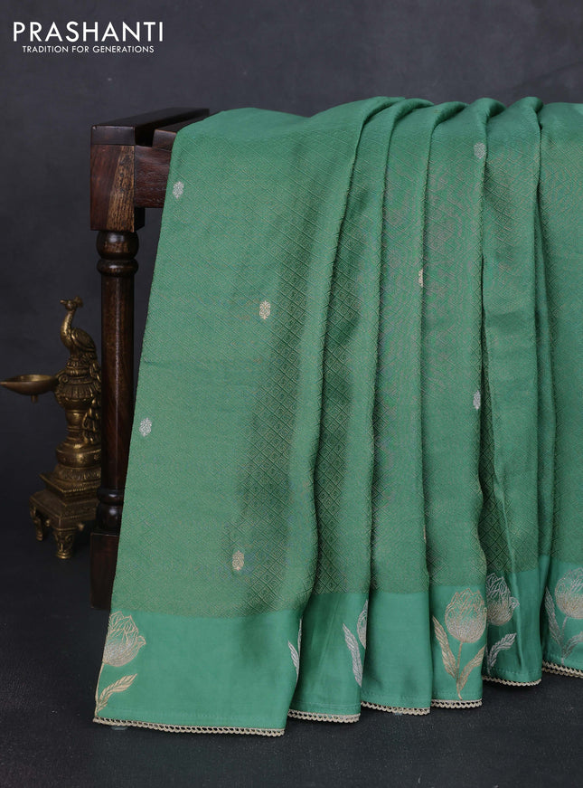 Banarasi silk saree teal green with allover zari woven brocade weaves and mirror embroidery pallu & zari woven butta border