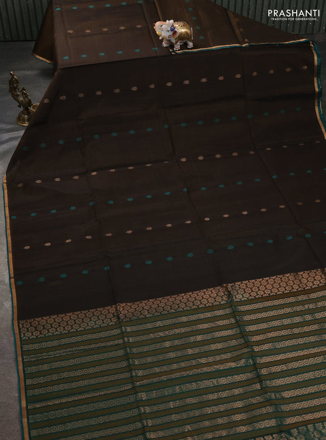 Kora silk cotton saree chikku shade and green with allover thread woven buttas and zari woven border