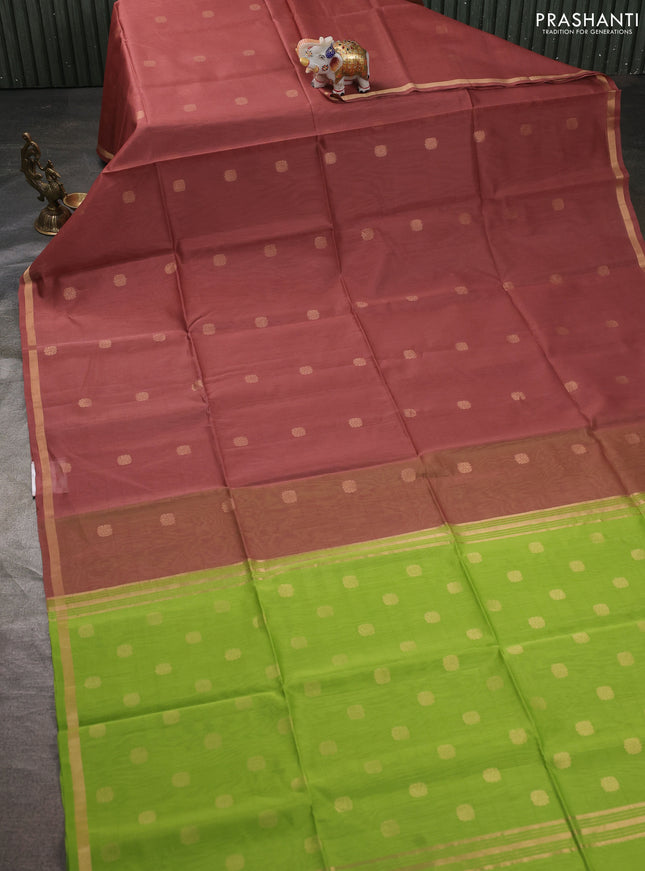 Kora silk cotton saree peach shade and light green with allover zari woven buttas and zari woven border