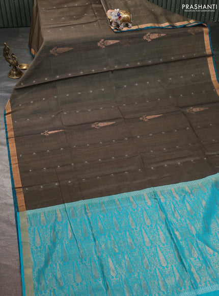 Kora silk cotton saree chikku shade and teal blue with allover zari woven buttas and zari woven border