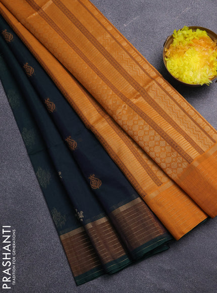 Kora silk cotton saree dual shade of bluish green and mustard yellow with thread & zari woven buttas and zari woven border