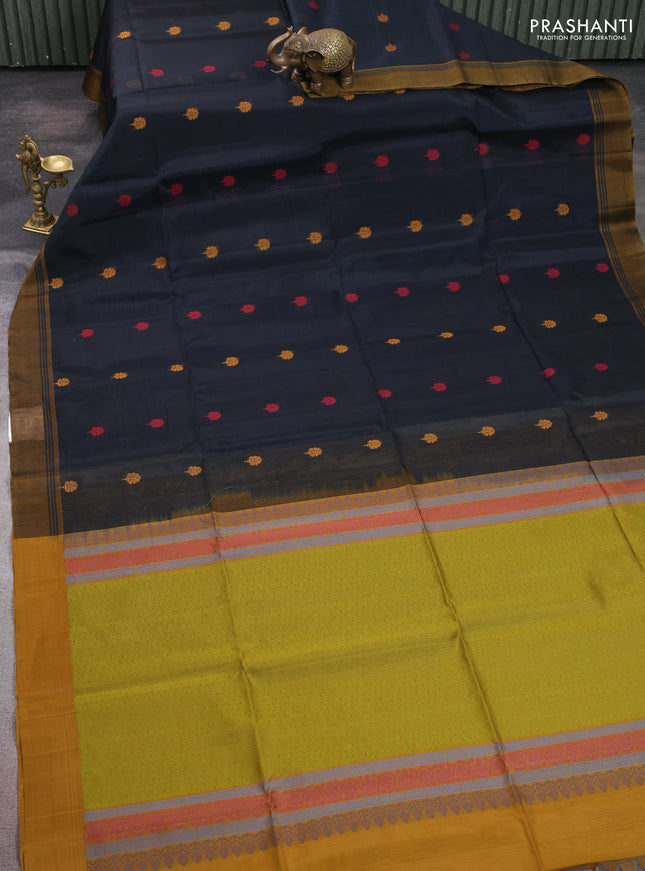 Kora silk cotton saree black and mustard yellow with allover thread woven buttas and simple border