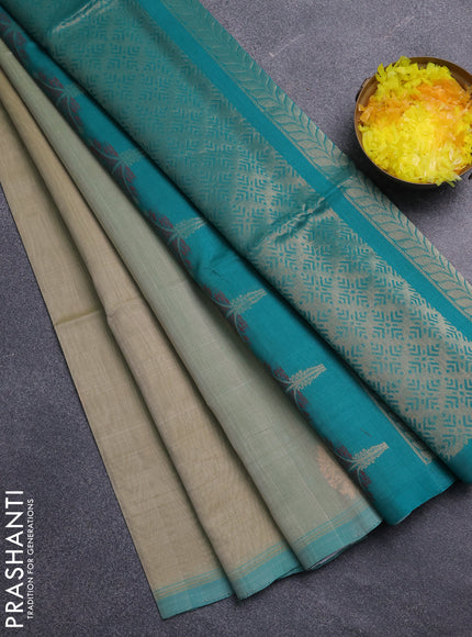 Kora silk cotton saree beige and teal green with zari woven buttas and simple border