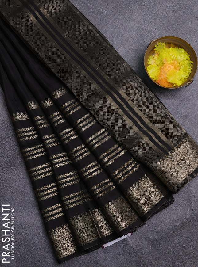 Semi mysore silk saree black and rustic orange with plain body and long zari woven border