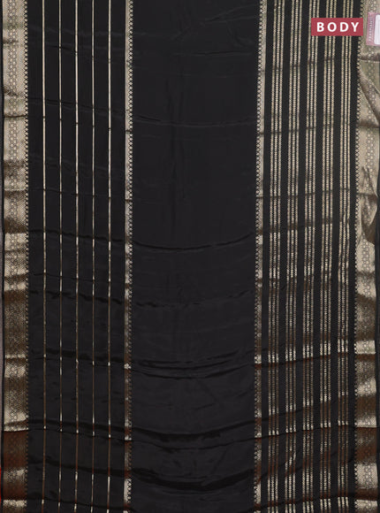 Semi mysore silk saree black and rustic orange with plain body and long zari woven border