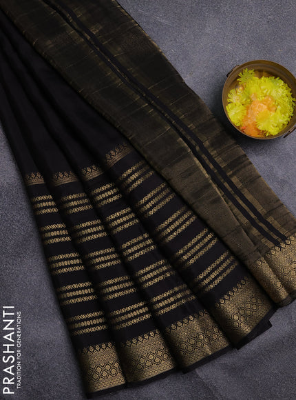 Semi mysore silk saree black and rustic orange with plain body and zari woven border