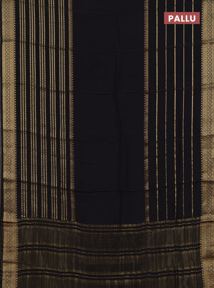 Semi mysore silk saree black and rustic orange with plain body and zari woven border