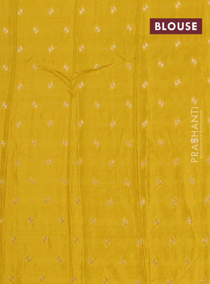 Semi mysore silk saree peacock blue and yellow with allover zari checks & buttas and zari woven border