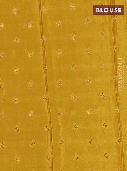Semi mysore silk saree purple and yellow with plain body and zari woven border