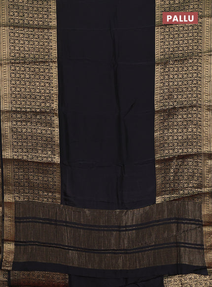Semi mysore silk saree black and rust shade with plain body and long zari woven border