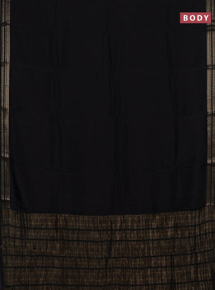 Semi mysore silk saree black and rustic orange with plain body and zari woven border