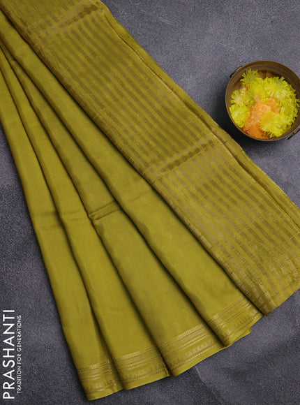 Semi mysore silk saree lime green and violet with plain body and zari woven border