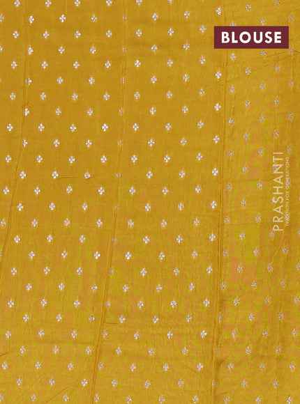 Semi mysore silk saree coffee brown and yellow with plain body and long rettapet zari woven border