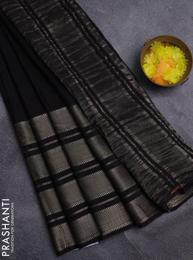 Semi mysore silk saree black and rust shade with plain body and long zari woven border