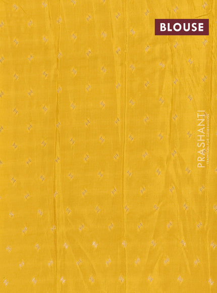 Semi mysore silk saree purple and yellow with zari woven buttas and long zari woven border