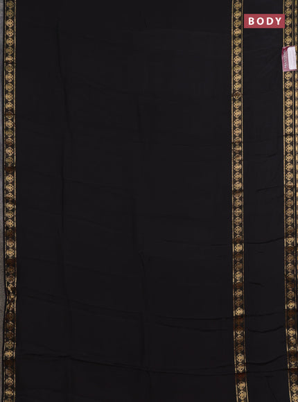 Semi mysore silk saree black and rustic orange with plain body and long rettapet zari woven border